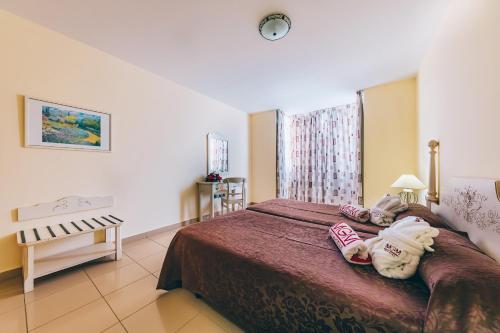 Junior Suite (4 Adults) del hotel Grand Muthu Golf Plaza Hotel and Spa. Foto 3