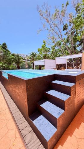 Suite Deluxe - Servicio MAGMA del hotel Grand Muthu Golf Plaza Hotel and Spa. Foto 1