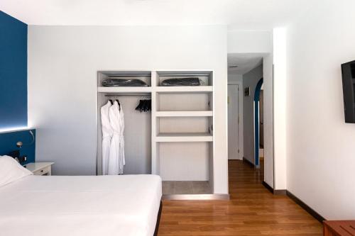 Habitación Familiar Premium del hotel Catalonia Punta del Rey. Foto 4