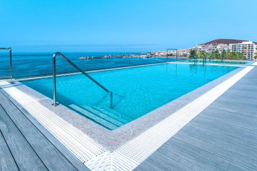 Habitación doble Vista Piscina Balcón o Terraza piscina 2 Camas individuales del hotel Spring Arona Gran Hotel - Adults Only. Foto 24