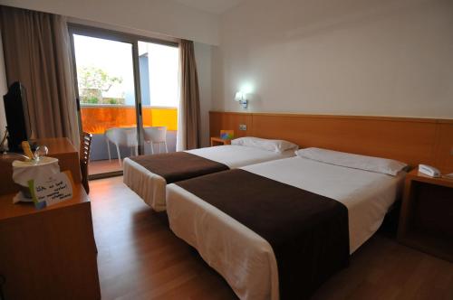 Habitación familiar Balcón o Terraza Premium 2 Camas individuales del hotel Paradise Park Fun Lifestyle