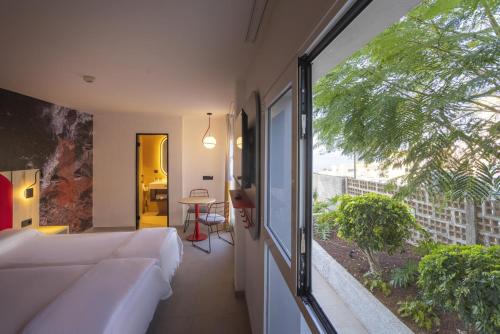 The Flow Double Room del hotel Sholeo Lodges Los Gigantes. Foto 2