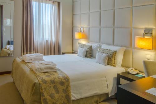 Habitación Doble Básica con acceso al spa del hotel Your and Spa Alcobaça. Foto 1