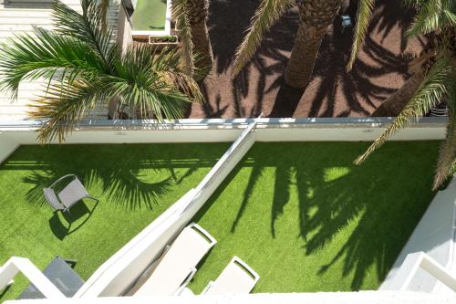 Habitación Doble con terraza del hotel Olé Tropical Tenerife Adults Only. Foto 4