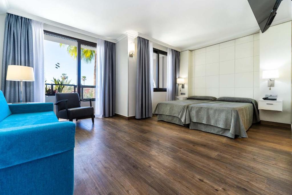 Habitación triple del hotel Spring Bitacora