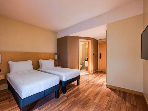 Habitación Estándar - 2 camas individuales del hotel Ibis Riyadh Al Muhammadiyah United Company Branch. Foto 2