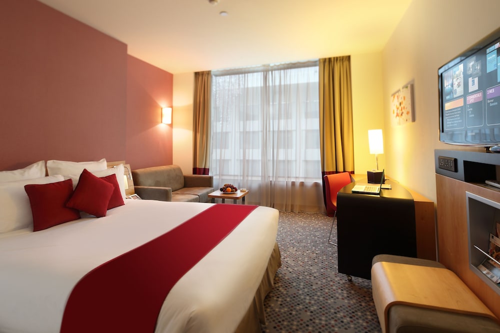 Habitación estándar, 1 cama doble con sofá cama del hotel Novotel Dammam Business Park. Foto 2