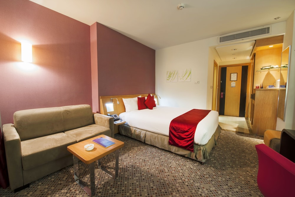 Suite superior, 1 cama doble con sofá cama del hotel Novotel Dammam Business Park. Foto 1