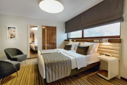 Habitación Doble Confort - 1 o 2 camas del hotel Leonardo Boutique Krakow City Center. Foto 6