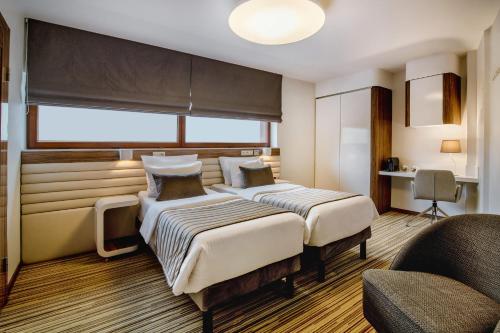 Habitación Doble Confort - 1 o 2 camas del hotel Leonardo Boutique Krakow City Center. Foto 7