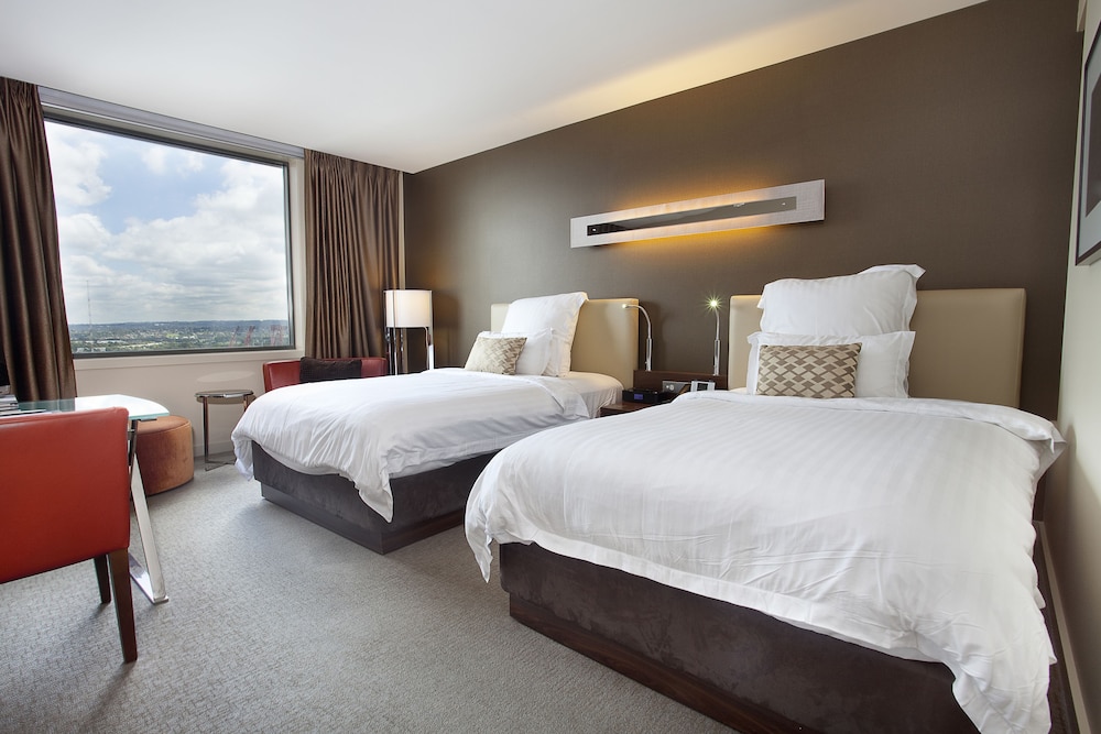 Habitación superior, 2 camas dobles del hotel Pullman At Sydney Olympic Park. Foto 1