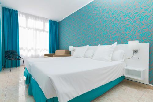 Habitación Doble Estándar - 2 camas del hotel Checkin Concordia Playa. Foto 1