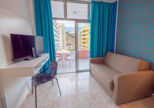 Habitación Triple Premium del hotel Checkin Concordia Playa. Foto 4