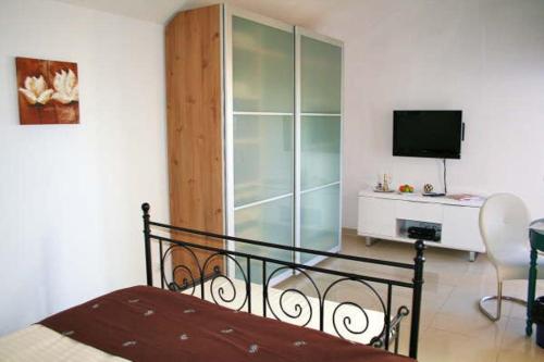 Habitación Doble Deluxe del hotel Birdcage Gay Resort - Adult Only. Foto 13