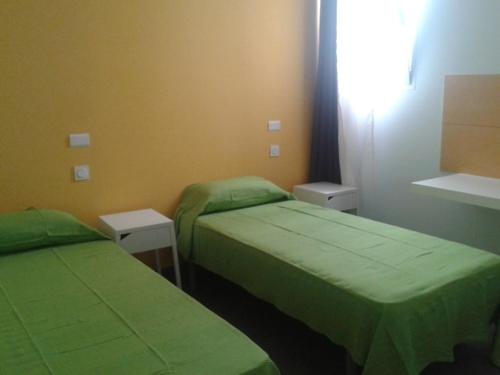 Habitación Doble con aseo compartido - 2 camas del hotel Falow. Foto 2