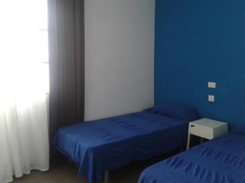 Habitación Doble Superior con 2 camas y baño privado del hotel Falow. Foto 21