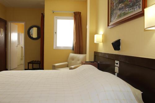 Double room del hotel Olympia. Foto 1