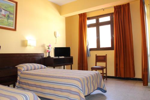 Double room del hotel Olympia. Foto 6