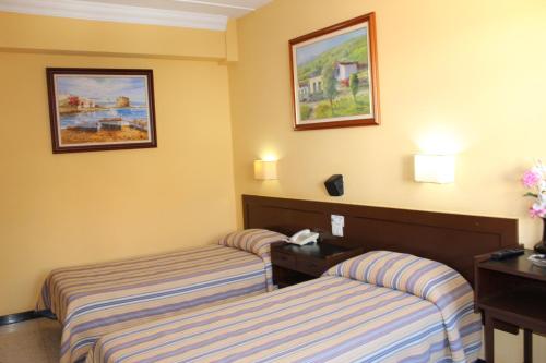 Double room del hotel Olympia. Foto 7