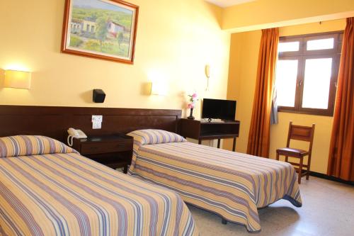 Double room del hotel Olympia. Foto 9