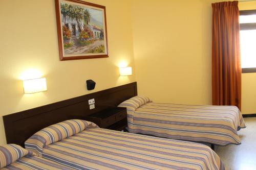 Triple room del hotel Olympia. Foto 1