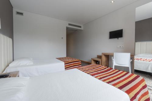 Habitación Doble - 2 camas del hotel Azinheira by RIDAN Hotels. Foto 4