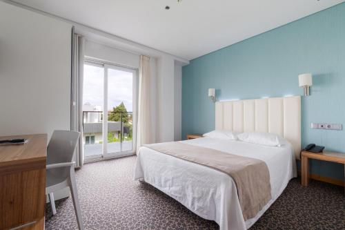 Habitación doble con balcón del hotel Azinheira by RIDAN Hotels
