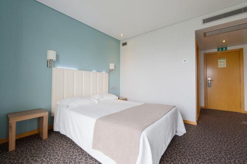 Habitación doble con balcón del hotel Azinheira by RIDAN Hotels. Foto 5