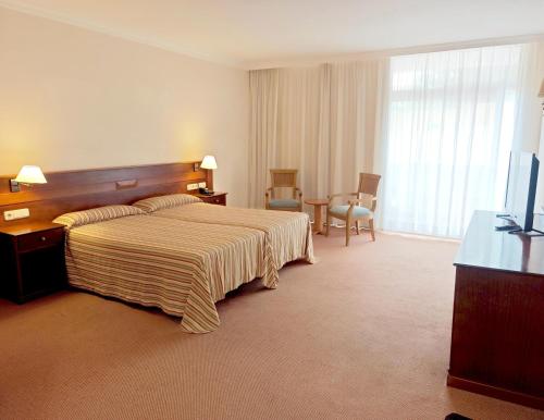 Habitación Doble con vistas a la montaña del hotel Complejo BLUESEA Puerto Resort Compuesto Por Canarife Y Bonanza Palace