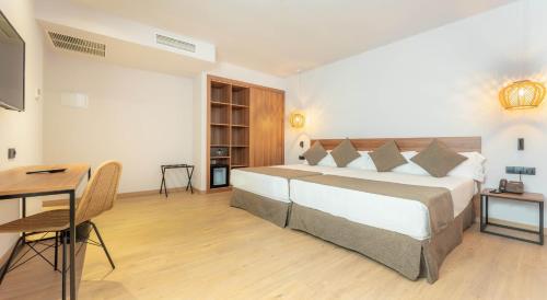 Habitación Cuádruple Estándar del hotel Dwo Nopal. Foto 1