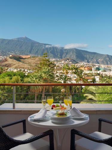 Deluxe Double with Mountain View del hotel Botanico and The Oriental Spa Garden. Foto 1