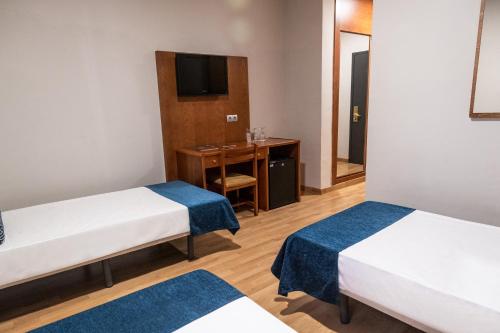 Triple room del hotel Adonis Plaza. Foto 5