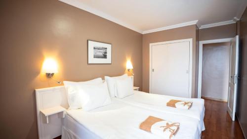 Apartamento de 1 dormitorio con vistas al jardín, a la piscina o al mar del hotel Coral La Quinta Park Suites. Foto 9