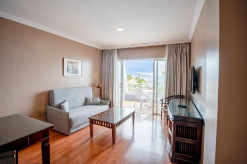 Apartamento de 1 dormitorio con vistas al jardín, a la piscina o al mar del hotel Coral La Quinta Park Suites. Foto 12