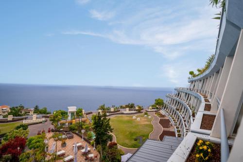 Apartamento de 1 dormitorio con vistas al jardín, a la piscina o al mar del hotel Coral La Quinta Park Suites. Foto 17