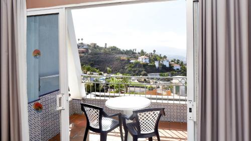 Apartamento de 1 dormitorio con vistas al jardín, a la piscina o al mar del hotel Coral La Quinta Park Suites. Foto 18