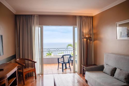 Apartamento de 1 dormitorio con vistas al jardín, a la piscina o al mar del hotel Coral La Quinta Park Suites. Foto 19
