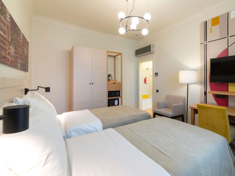 Habitación superior con 2 camas individuales del hotel Mercure Belgrade Excelsior. Foto 11