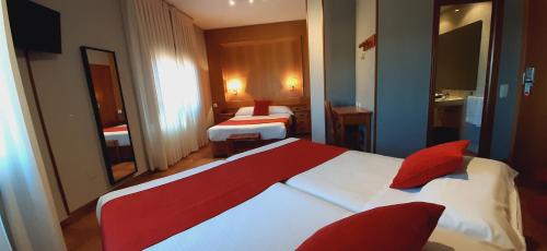 Habitación Familiar Estándar del hotel Real De Toledo. Foto 4