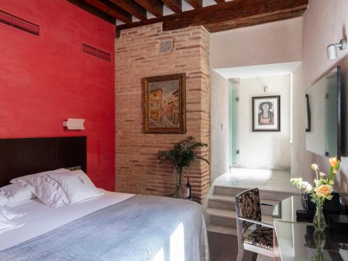 Habitación Deluxe del hotel Pintor El Greco. Foto 1