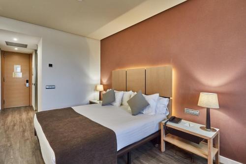 Habitación Doble Confort - 1 o 2 camas del hotel Silken Puerta De Valencia. Foto 1