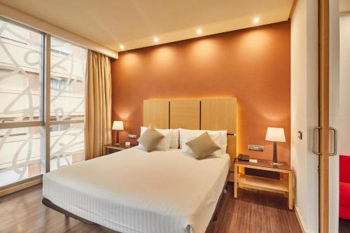Habitación Familiar del hotel Silken Puerta De Valencia. Foto 5