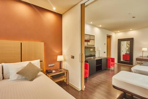 Habitación Familiar del hotel Silken Puerta De Valencia. Foto 8