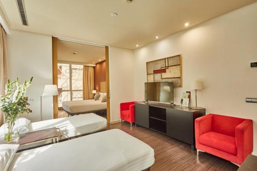 Habitación Familiar del hotel Silken Puerta De Valencia. Foto 10