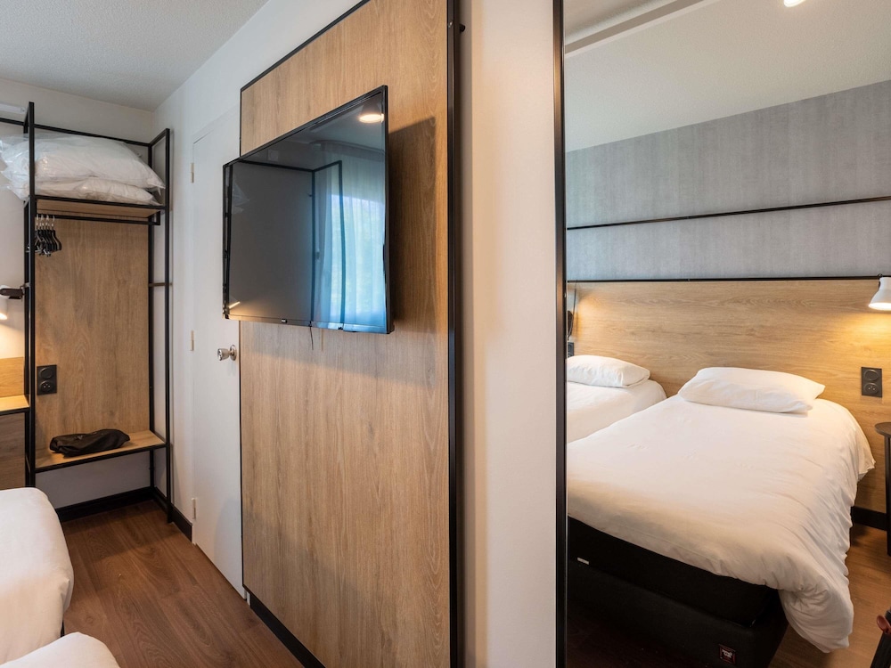 Habitación Standard con dos camas individuales del hotel Ibis Saint Lo La Chevalerie. Foto 5
