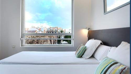 Habitación Doble - 1 o 2 camas del hotel Sea You Port Valencia. Foto 9
