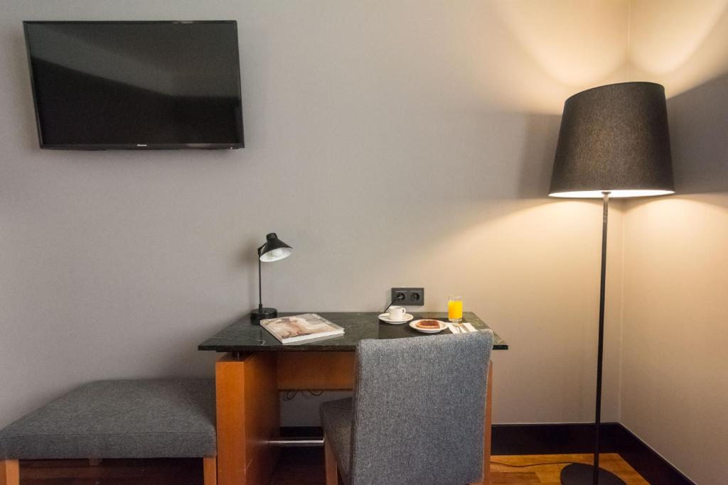 Habitación individual del hotel Malcom and Barret. Foto 1