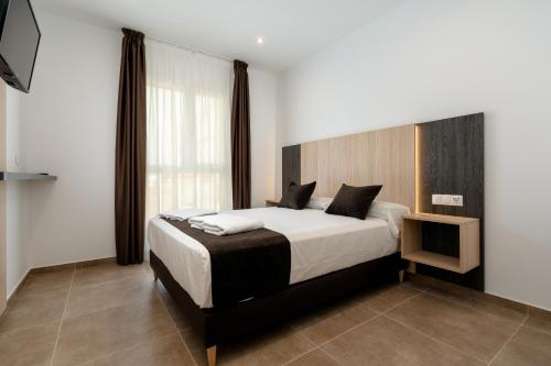 Habitación Doble Estándar del hotel y apartamentos Plaza De La Luz Cádiz. Foto 5