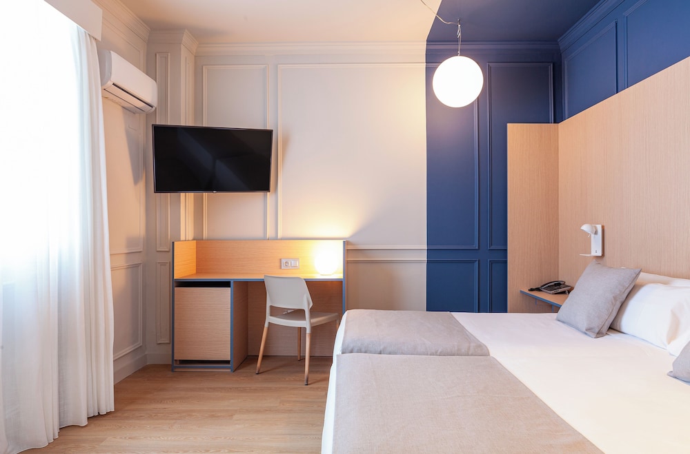 Habitación con 1 cama doble o 2 individuales del hotel Olympia Cónsul del Mar. Foto 16