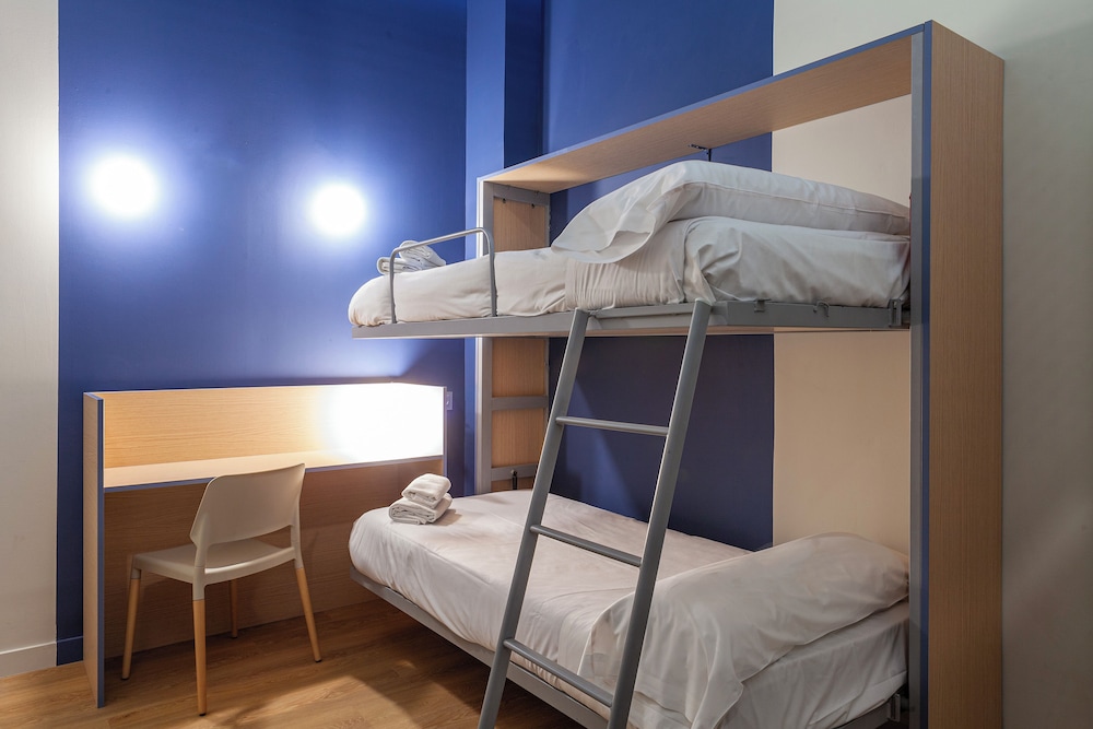 Habitación cuádruple 2 Camas individuales 1 Cama doble Normal del hotel Olympia Cónsul del Mar. Foto 11